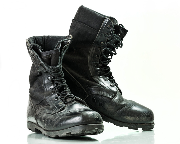 Black old combat military boots isolated on white background - Photo, Image