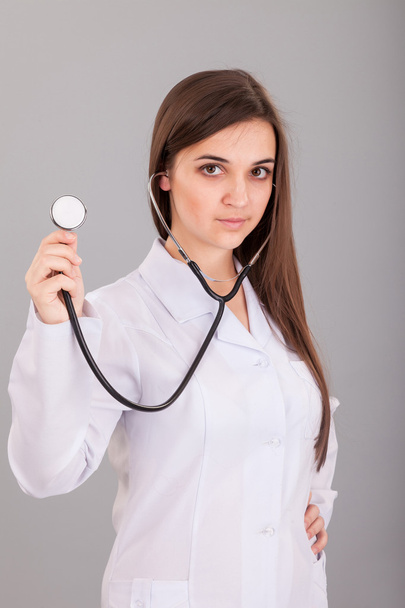 Nurse Holding Stethoscope - Foto, afbeelding