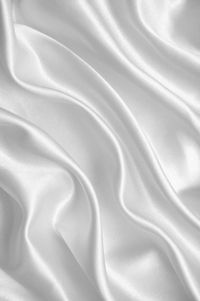 Smooth elegant white silk or satin as wedding background - Photo, image