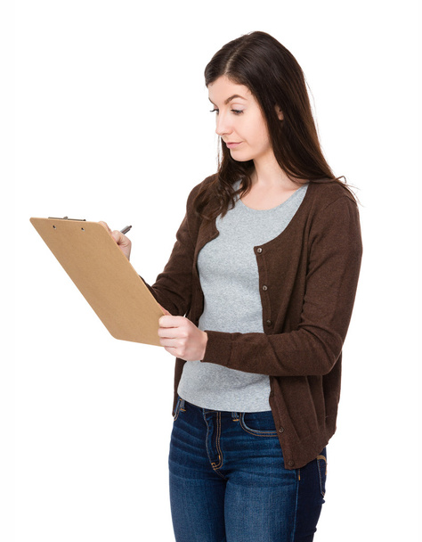 caucasian young woman in brown cardigan - Photo, image