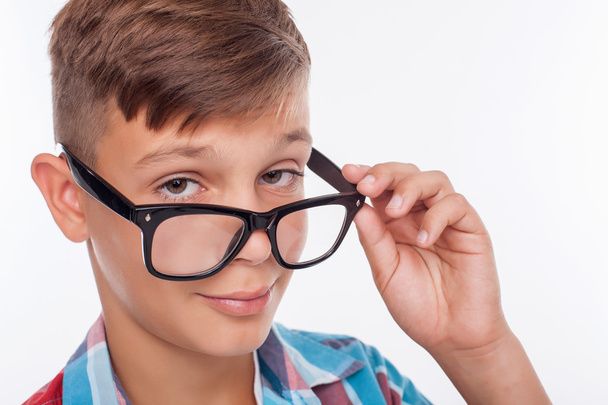 Cheerful boy is making fun with eyewear - Foto, imagen