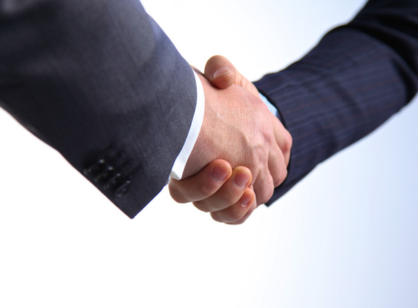 Üzleti kézfogás. Két üzletember kezet egymással az irodában - Fotó, kép