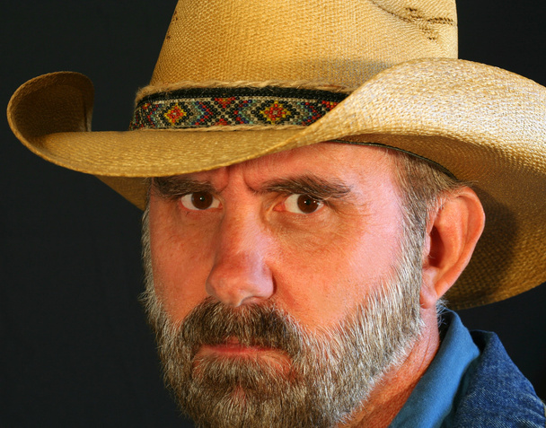 A Bearded Cowboy with a Stern Frown - Photo, Image