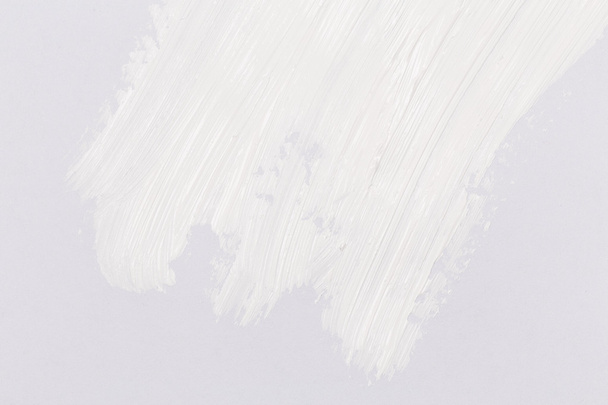 Paint brush stroke over the white paper - Fotoğraf, Görsel