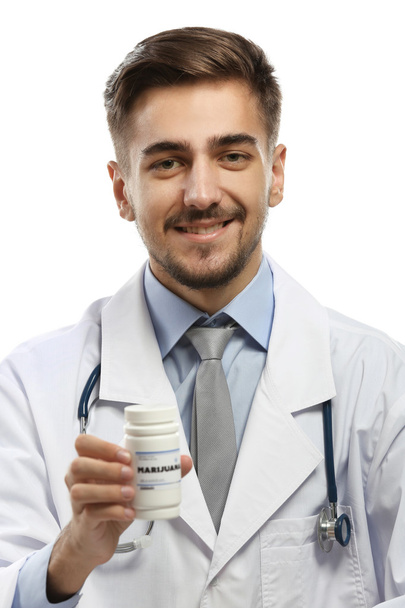 Doctor holding bottle - Фото, зображення