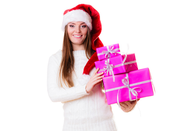 Woman santa helper hat with many pink gift boxes - Foto, Imagem