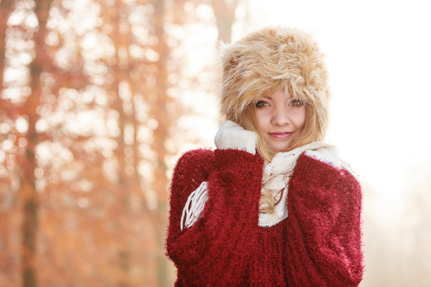 Pretty fashion woman in fur winter hat. - Фото, зображення