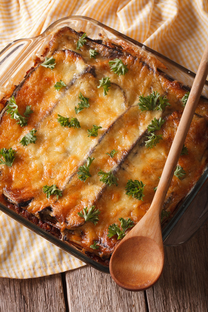 Greek moussaka with eggplant close up in baking dish. vertical t - 写真・画像