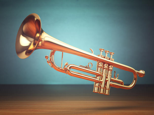 Polished brass trumpet on green background. - Foto, immagini