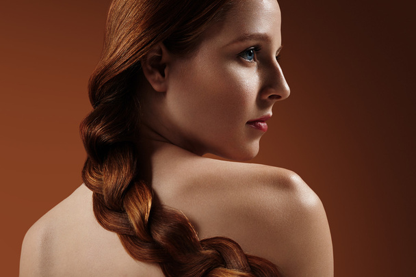 redhead woman with braid - Zdjęcie, obraz