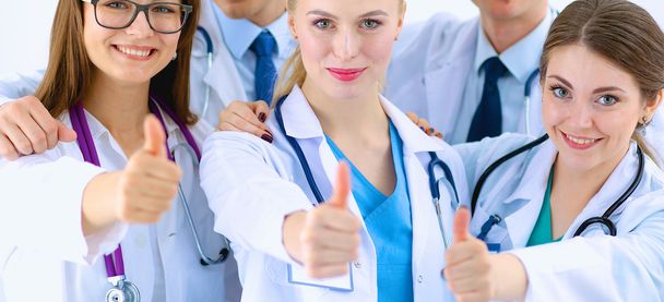 Retrato da equipe de médicos mostrando polegares para cima
  - Foto, Imagem