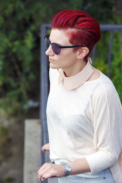portrait of red-haired woman with sunglasses - Photo, Image