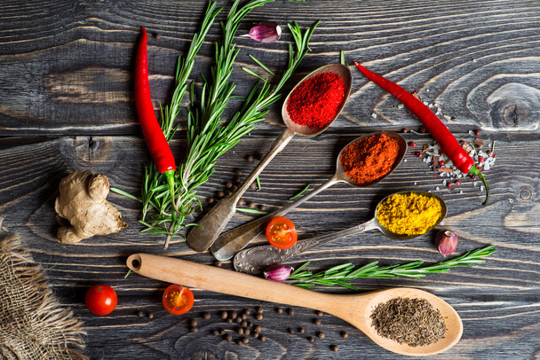 Spices over wooden background - 写真・画像