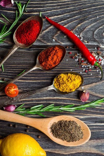 Spices over wooden background - Foto, imagen