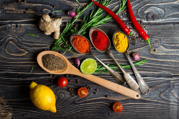 Spices over wooden background - Foto, immagini