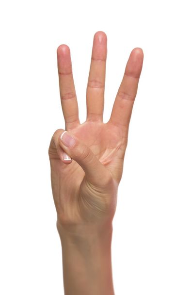Woman hand showing three fingers. - Φωτογραφία, εικόνα
