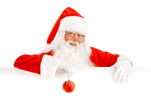 Santa Claus Holding a Advertising Space - Foto, imagen