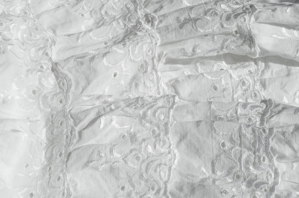 Tecido de algodão branco, com padrões
 - Foto, Imagem