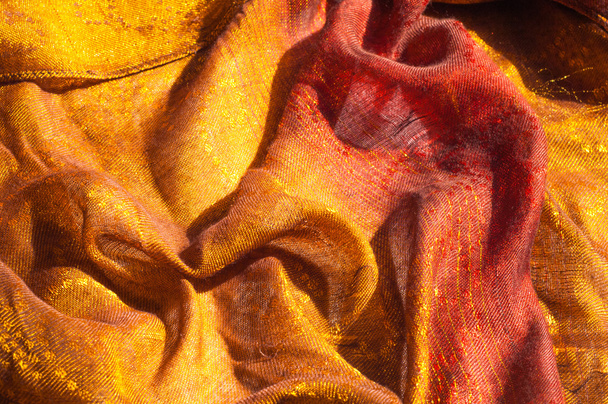 De textuur van wol stof geel rood gouden - Foto, afbeelding