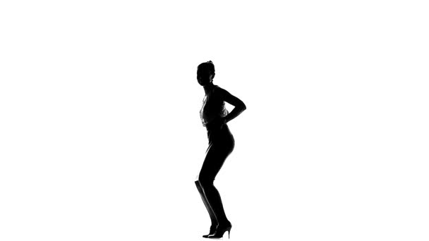 Professional social latin dancer girl making moves dancing, on white, slow motion, silhouette - Video