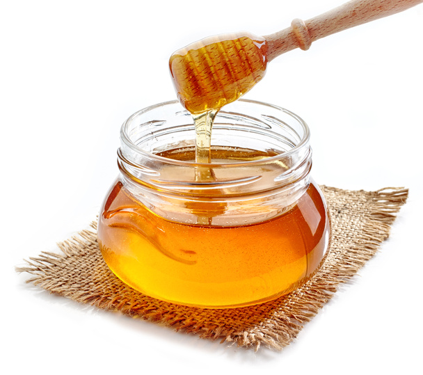 Honig in Glas gießen - Foto, Bild
