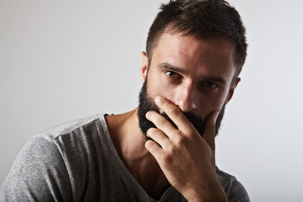 Portrait of a pensive bearded man - Фото, зображення