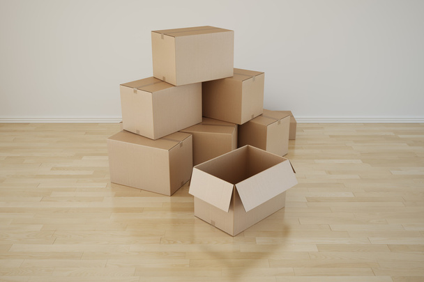Cardboard boxes in empty room - Zdjęcie, obraz