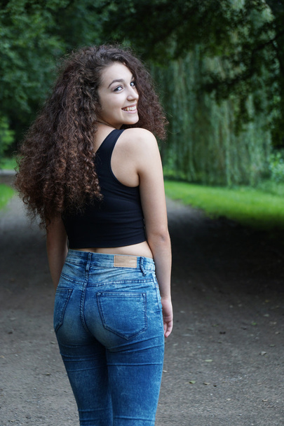 young woman turning around - Fotografie, Obrázek