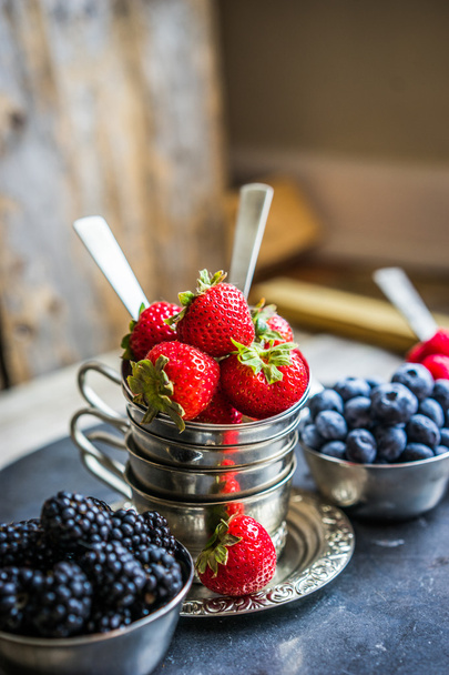 Mix of fresh berries on rustic background - Foto, Imagem