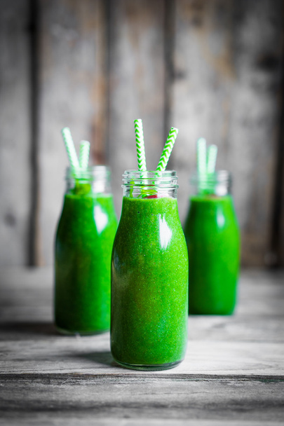 Fresh green smoothie on rustic wooden background - Photo, Image