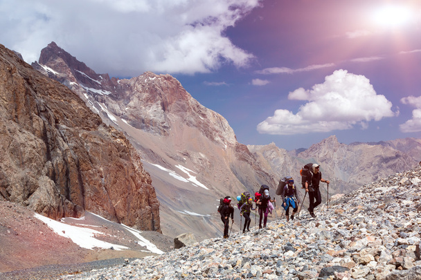 Group of Mountaineer Walking on Deserted Rocky Terrain - Fotoğraf, Görsel