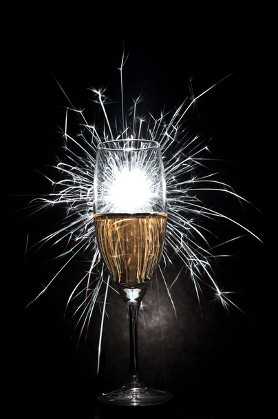 Champagne glass and fireworks - Photo, Image