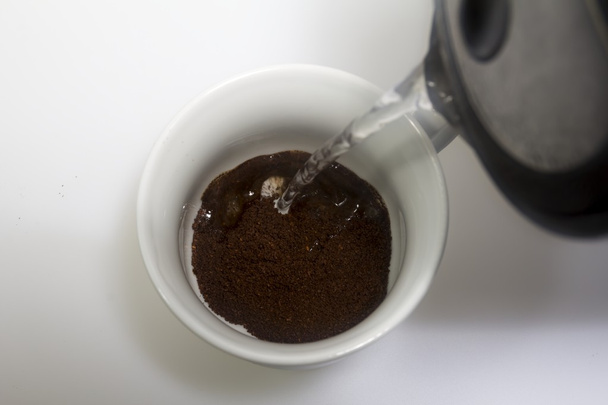 delicious black coffee in a white cup - Fotoğraf, Görsel