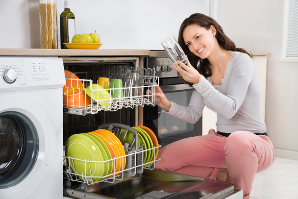 Woman Taking Drinking Glass From Dishwasher - Photo, Image