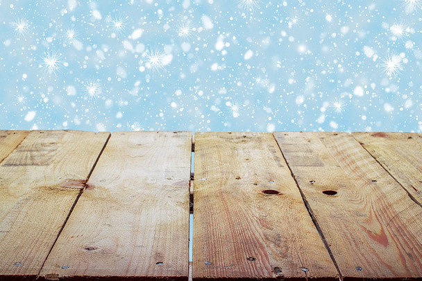 Christmas holiday background with empty wooden deck table  - Photo, Image