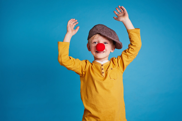 boy with clown nose - Photo, Image