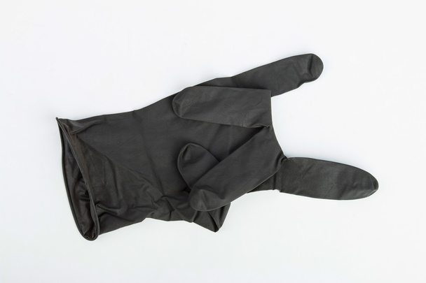 Black Surgical Latex Glove. - 写真・画像