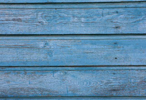 drei hellblaue Holzplanken mit abblätternder Farbe, Textur - Foto, Bild