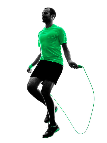 man jumping rope exercises fitness silhouette - Foto, Bild