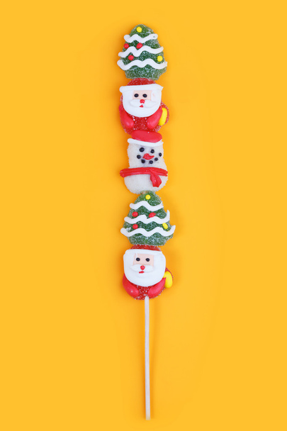 Sugar candy with a wooden stick - Фото, зображення