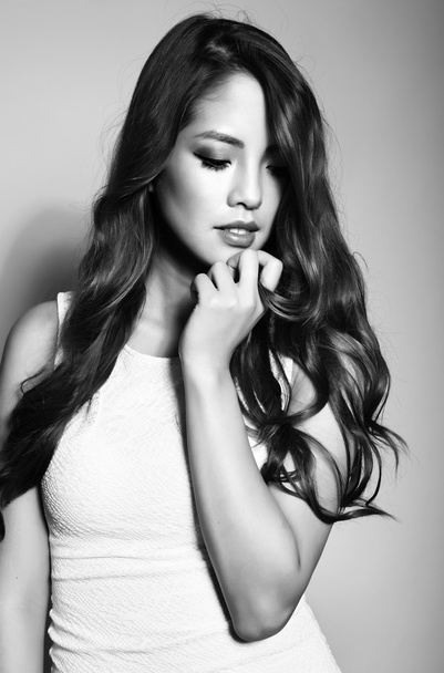 beautiful asian young woman in white dress with flawless skin - Zdjęcie, obraz