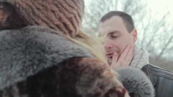 Woman touching boyfriend cheeks - Footage, Video