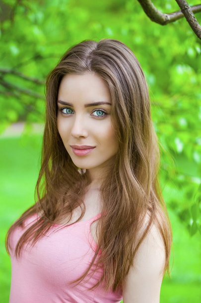Russian beauty - Young brunette girl at a white birch - Photo, Image