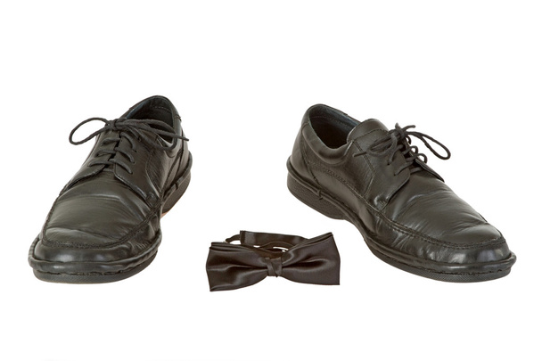 Ανδρικό παπούτσι και παπιγιόν - Φωτογραφία, εικόνα