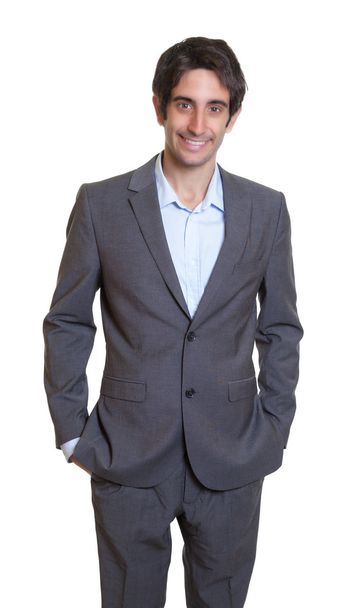 Standing latin businessman with suit and short hair - Fotó, kép