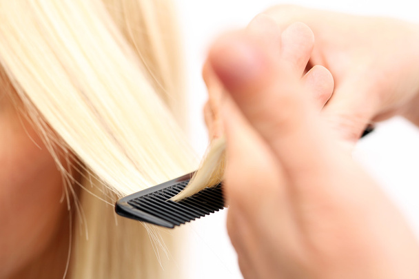 Combing hair - Fotoğraf, Görsel