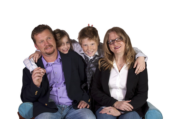 roztomilá rodina pózuje na bílém pozadí - Fotografie, Obrázek
