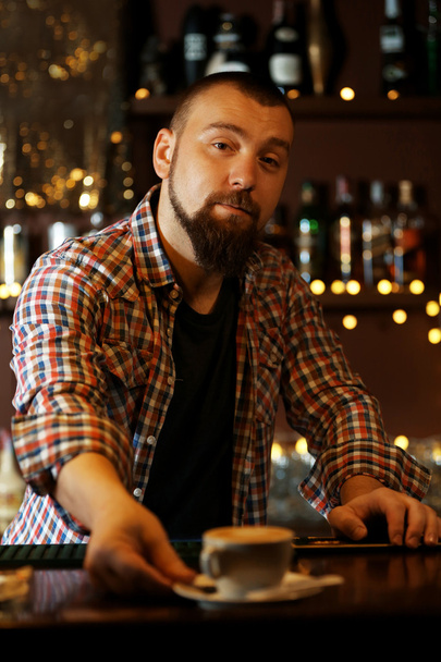 Portrait of handsome bartender at bar - Фото, зображення