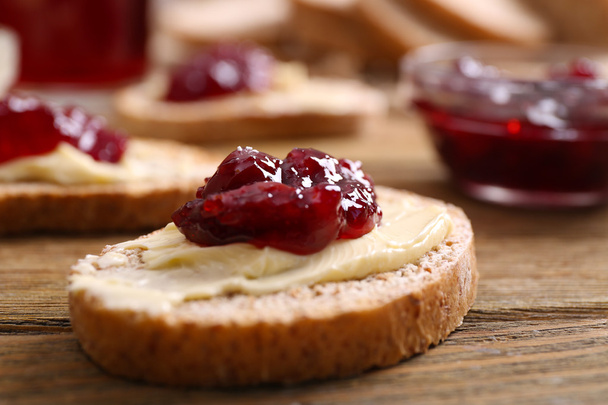 Fresh toast with butter and jam on table close up - Fotografie, Obrázek