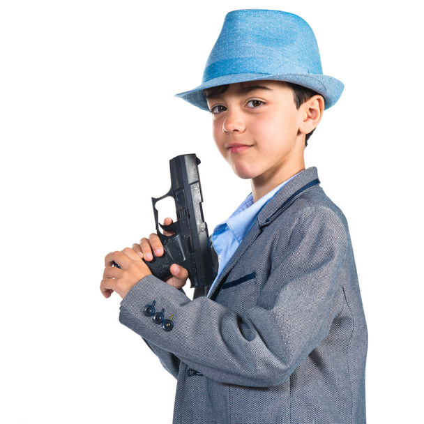 Gangster boy holding a gun  - Photo, image